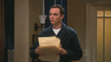 sheldon cooper throwing papers in frustration