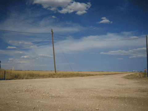 Tubleweed blowing across kansas GIF