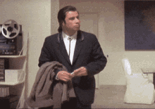 Confused Travolta GIF representing me looking for the 100x productivity receipts